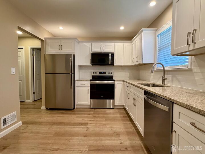 Property Photo:  8 Benjamin Franklin Drive F  NJ 08831 