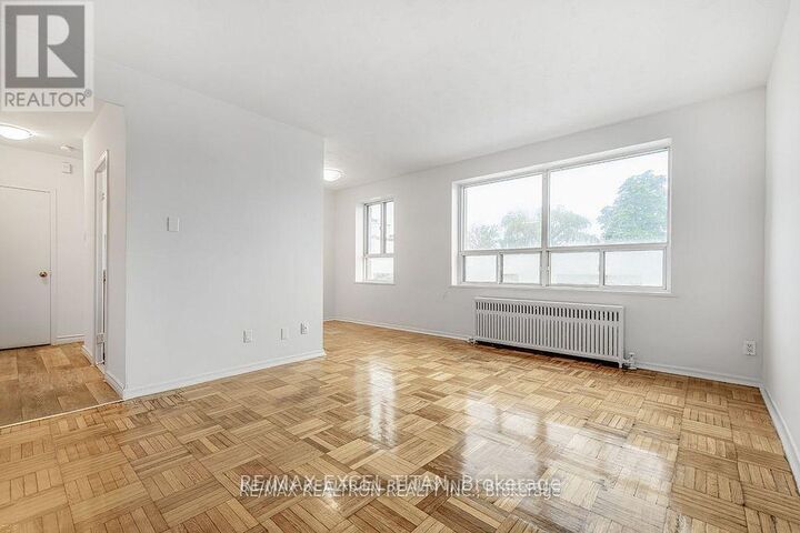 Property Photo:  156 Kingston Road 306  ON M4L 1S7 