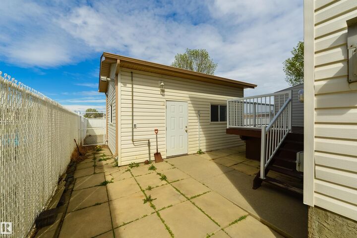 Property Photo: 5604 Garden Meadows Drive AB T9A 3S5