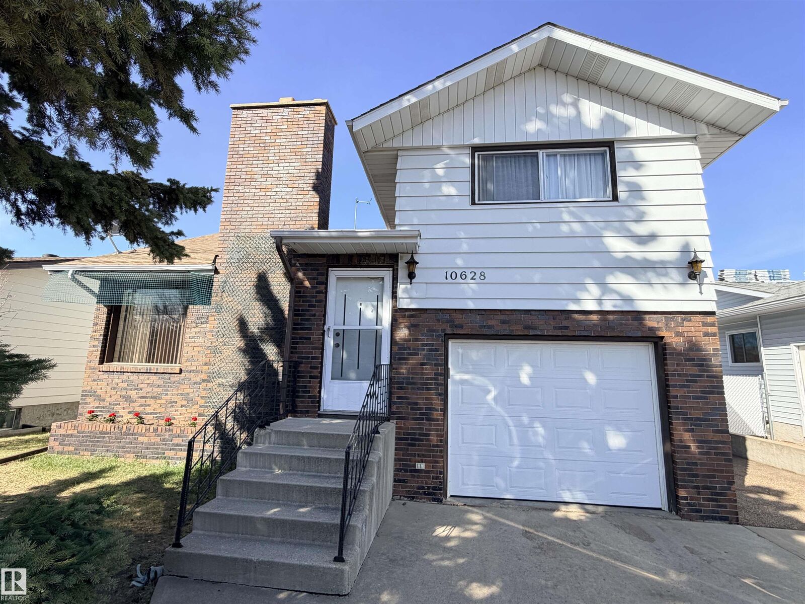 Property Photo: 10628 109 Street AB T7P 1A9