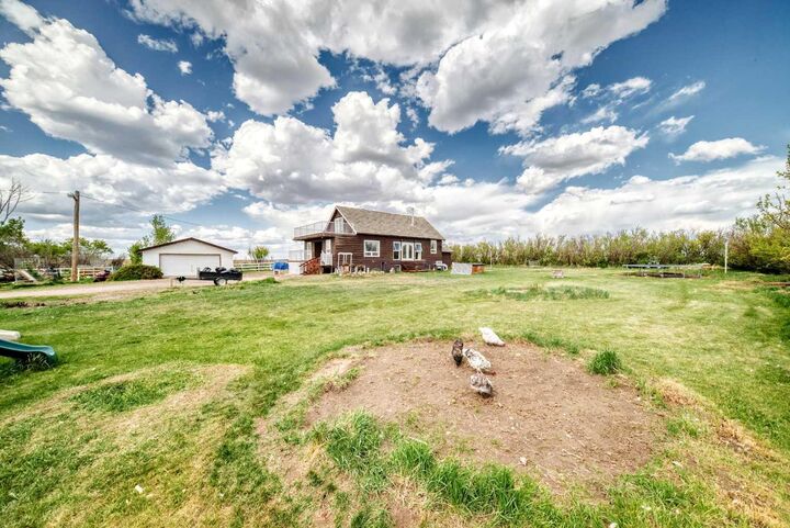 Property Photo: 225079 Range Road 245 AB T1P 0N5