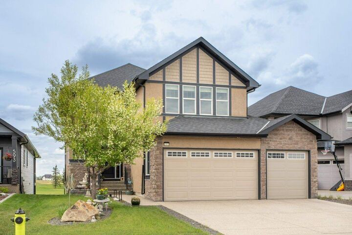 Property Photo: 597 Muirfield Crescent AB T0J 1Y1