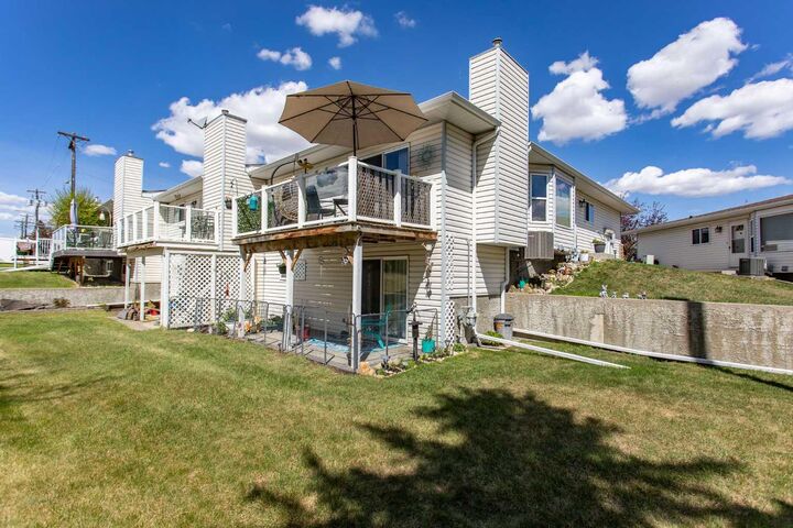 Property Photo:  5125 62 Street 4  AB T4N 6Y3 