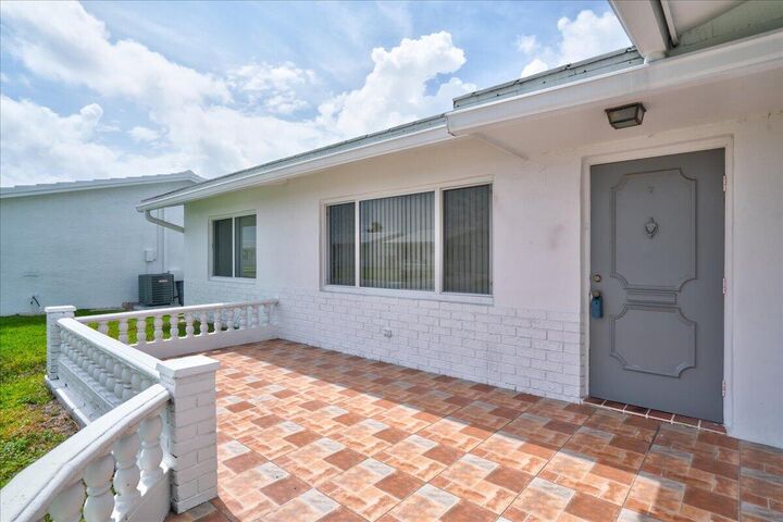 Property Photo:  2086 SW 12th Avenue  FL 33426 