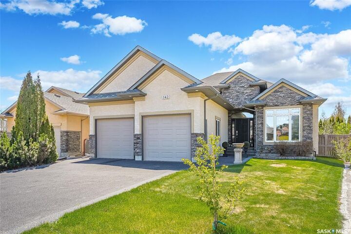 Property Photo:  142 Assaly Street  SK S7T 0E4 