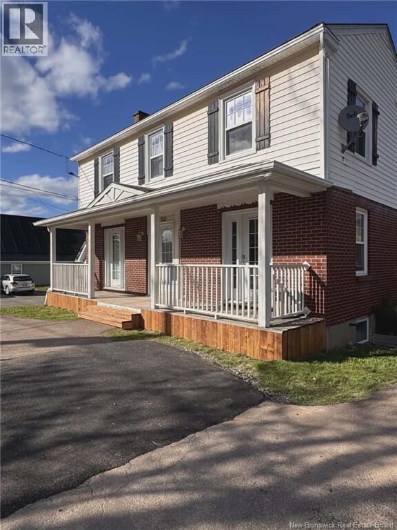 Property Photo: 303 McLaughlin Drive NB E1A 4R1