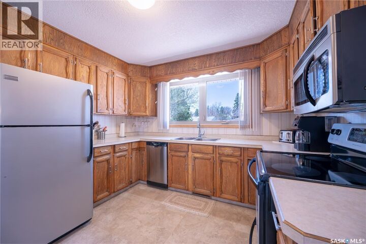 Property Photo:  242 Fifth Avenue N  SK S3N 0Z9 