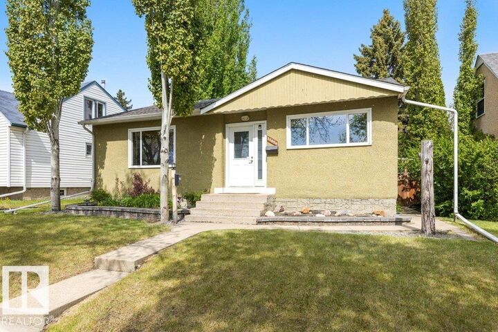 Property Photo:  13056 Sherbrooke Avenue NW  AB T5L 4E9 