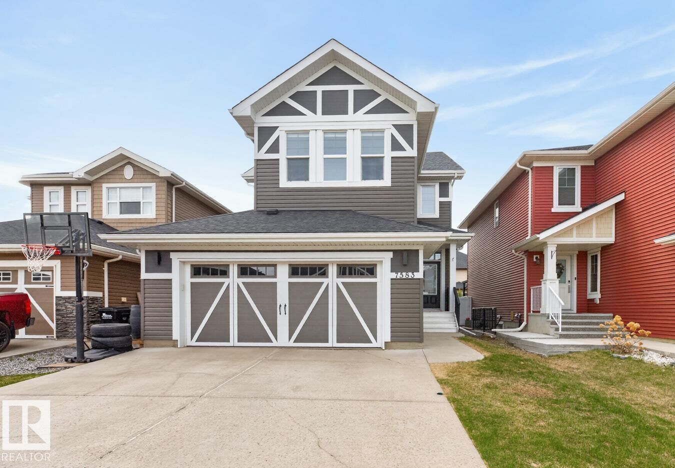Property Photo: 7583 Ellesmere Way AB T8H 0P7