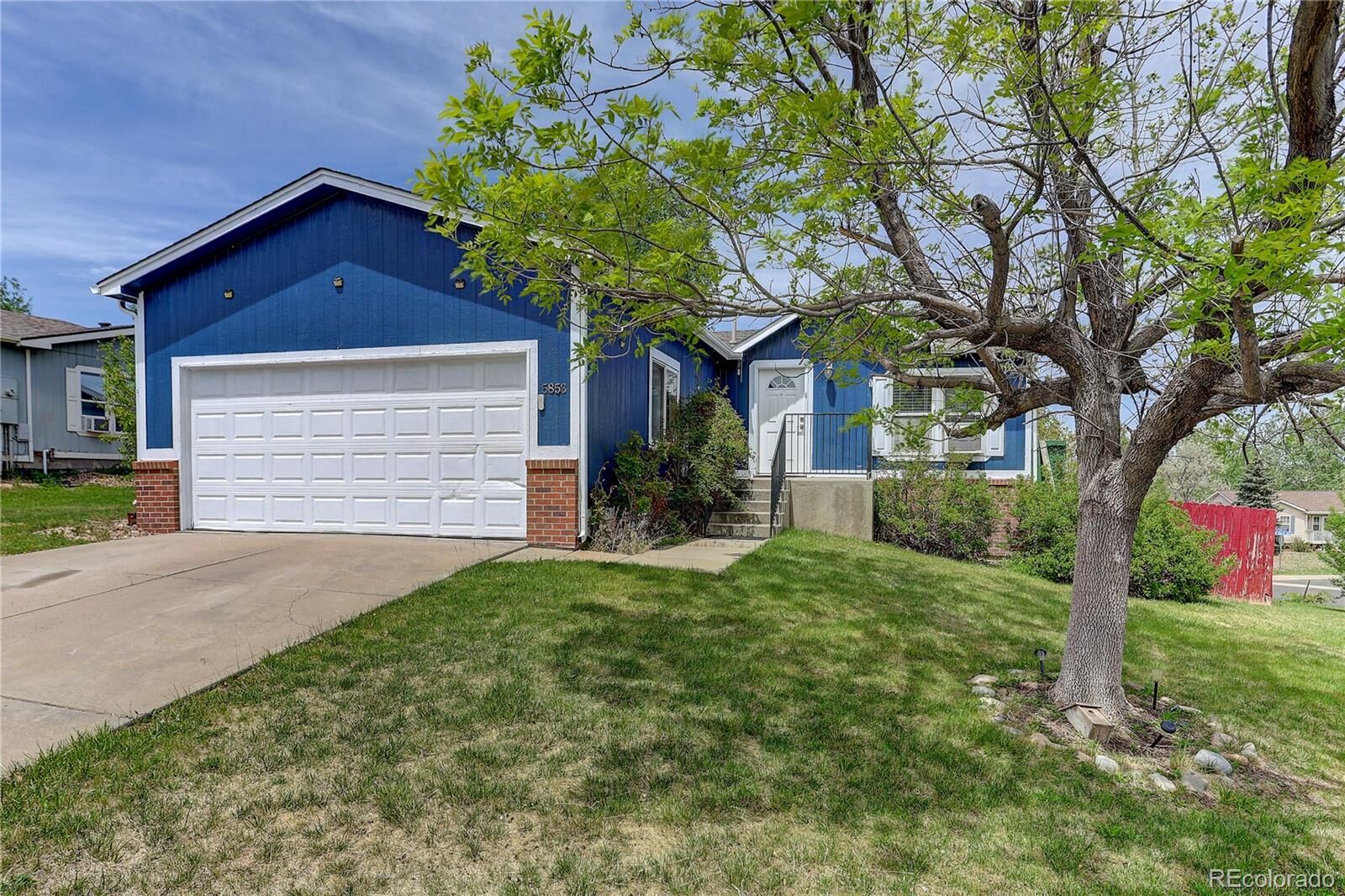 Property Photo:  5853 S Quemoy  CO 80015 