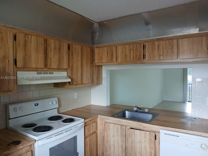 Property Photo:  9141 NW 1st Ct 204  FL 33024 