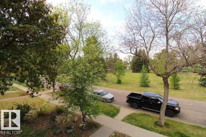 Property Photo:  7715 84 Avenue NW  AB T6C 1C3 