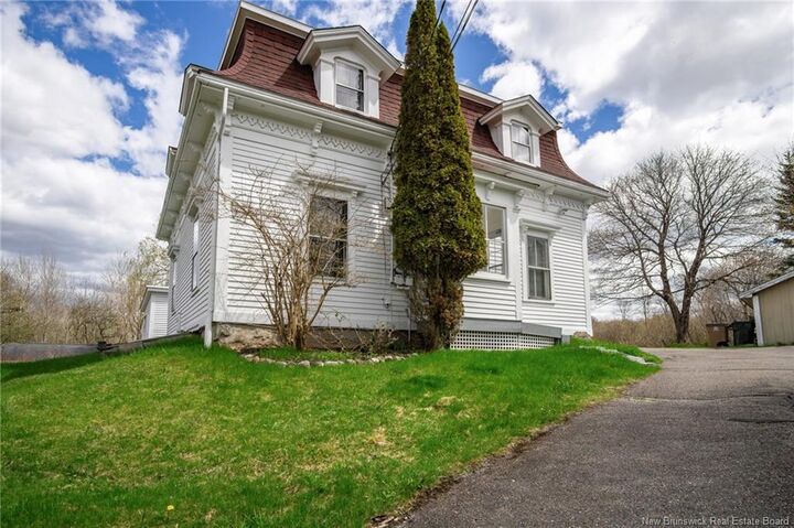 Property Photo:  697 Bay Street  NB E2M 7L6 