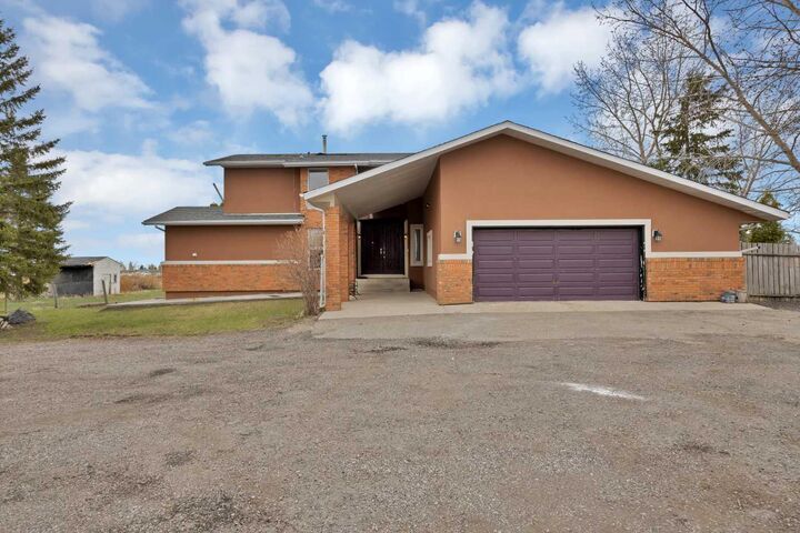 Property Photo: 283129 Township Road 250 AB T1X 0M8