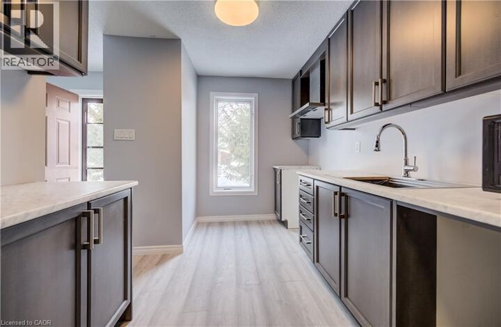 Property Photo: 249 Cedarbrae Avenue 18 ON N2L 4S8