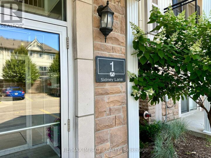Property Photo: 1 Sidney Lane 104 ON L1C 0C6