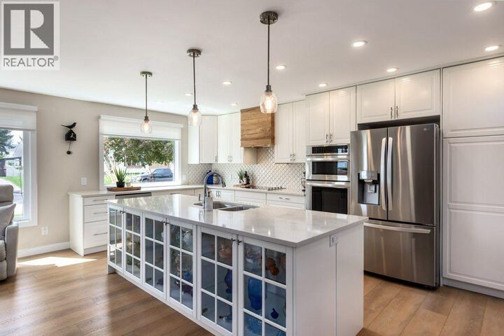 Property Photo:  1148 120 Avenue Southeast  AB T2J 2L3 