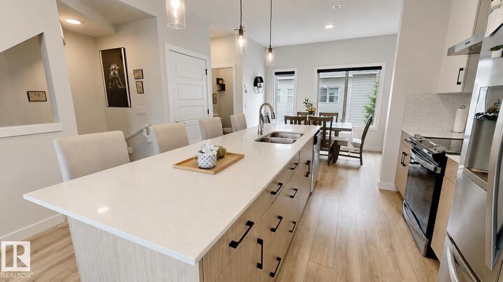 Property Photo: 804 Welsh Drive SW 182 AB T6X 1Y8