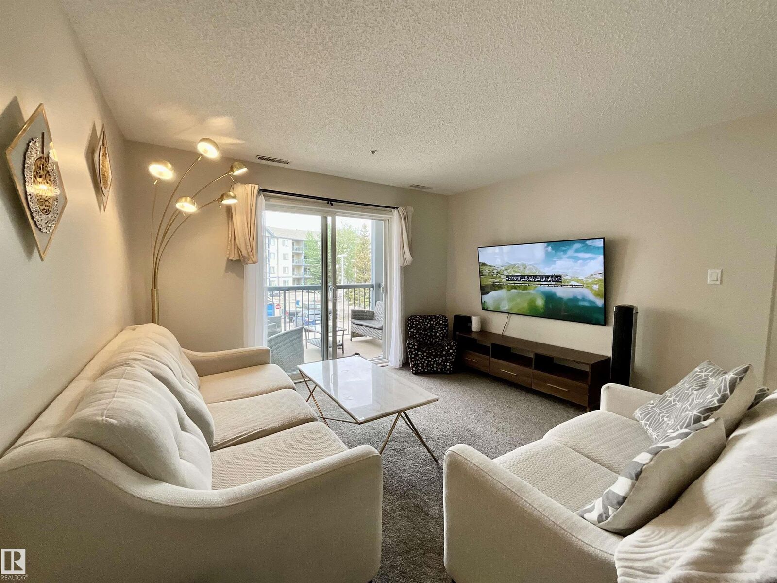 Property Photo: 16303 95 Street NW 217 AB T5Z 3V1