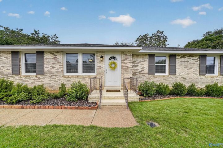 Property Photo: 7602 Ensley Drive SW AL 35802