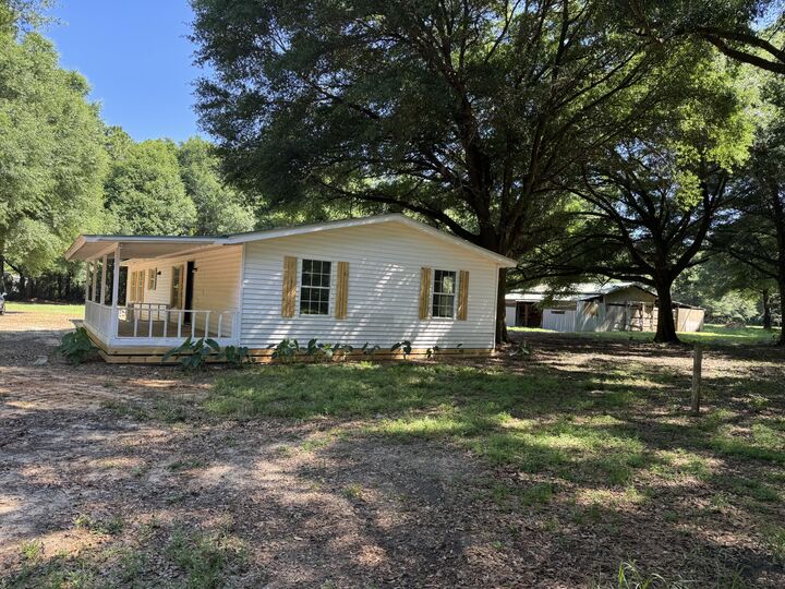 Property Photo:  12400 Wildlife Road  FL 32564 
