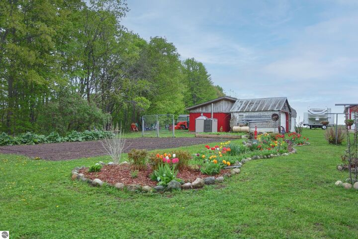 Property Photo:  8201 Essex Road  MI 49729 