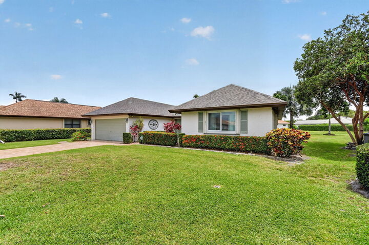 Property Photo:  10460 Greentrail Drive N  FL 33436 