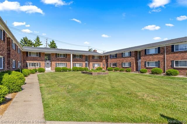 Property Photo:  31831 Grand River Avenue 86  MI 48336 