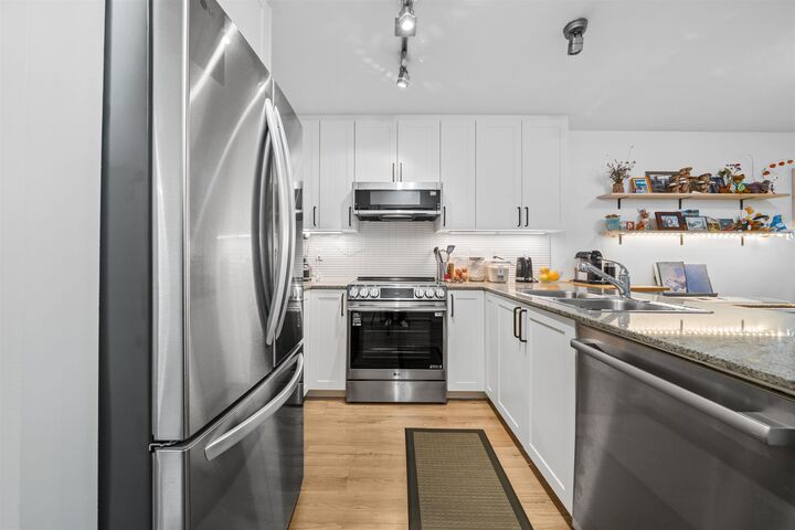 Property Photo:  4833 Brentwood Drive 203  BC V5C 0C3 