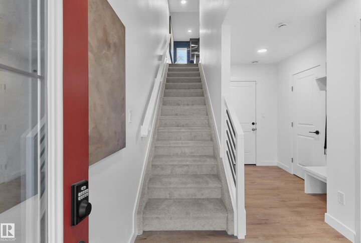 Property Photo: 2032 Marquis Way NE AB T5Y 4E7