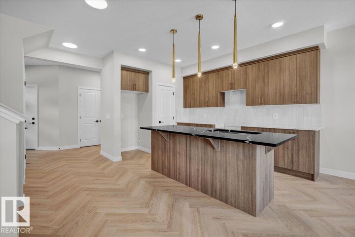 Property Photo: 2209 Crossbill Link NW AB T5S 0W3