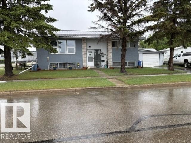 Property Photo:  5002 41 Ave  AB T9A 0B1 