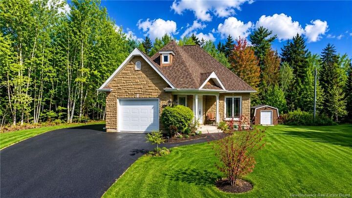 Property Photo:  502 Woodland Drive  NB E2A 4Z1 