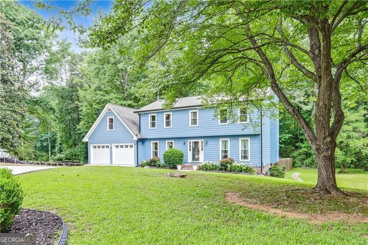 Property Photo:  5168 Hidden Hills Trace  GA 30088 