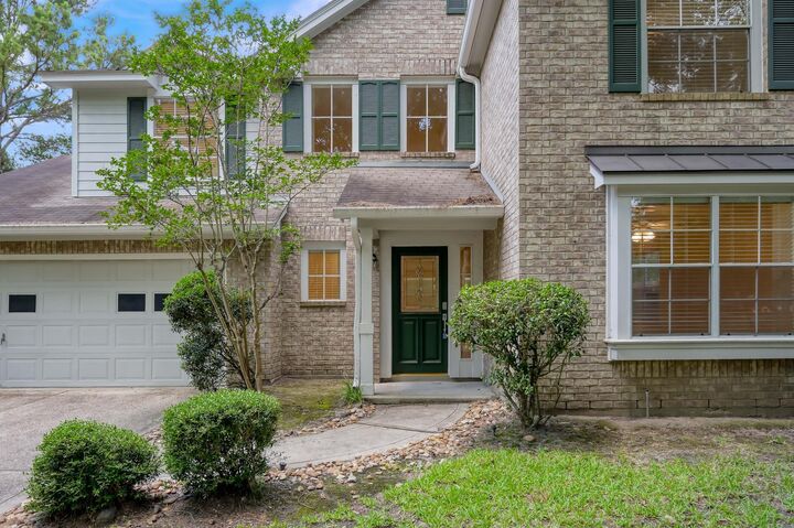 Property Photo: 34 S Willow Point Circle TX 77382