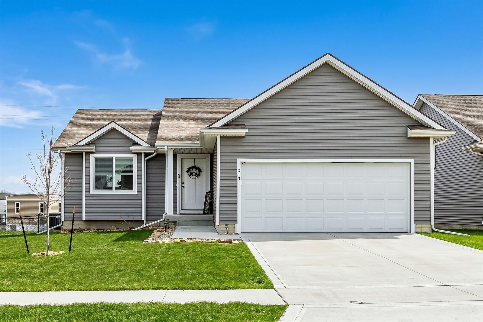Property Photo:  213 NE Adams Avenue  IA 50073 
