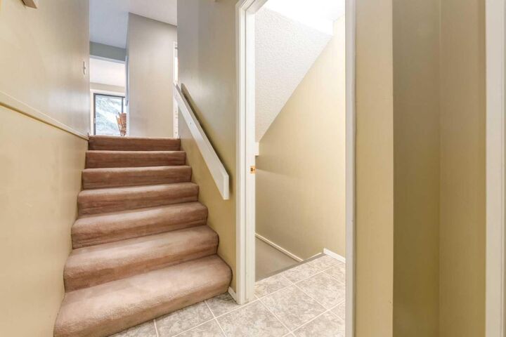 Property Photo:  3302 50 Street NW 10  AB T3A 2C6 