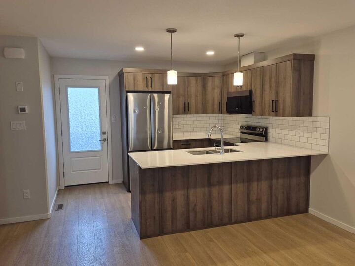 Property Photo:  594 Aquitania Boulevard W 3  AB T1J 5X4 