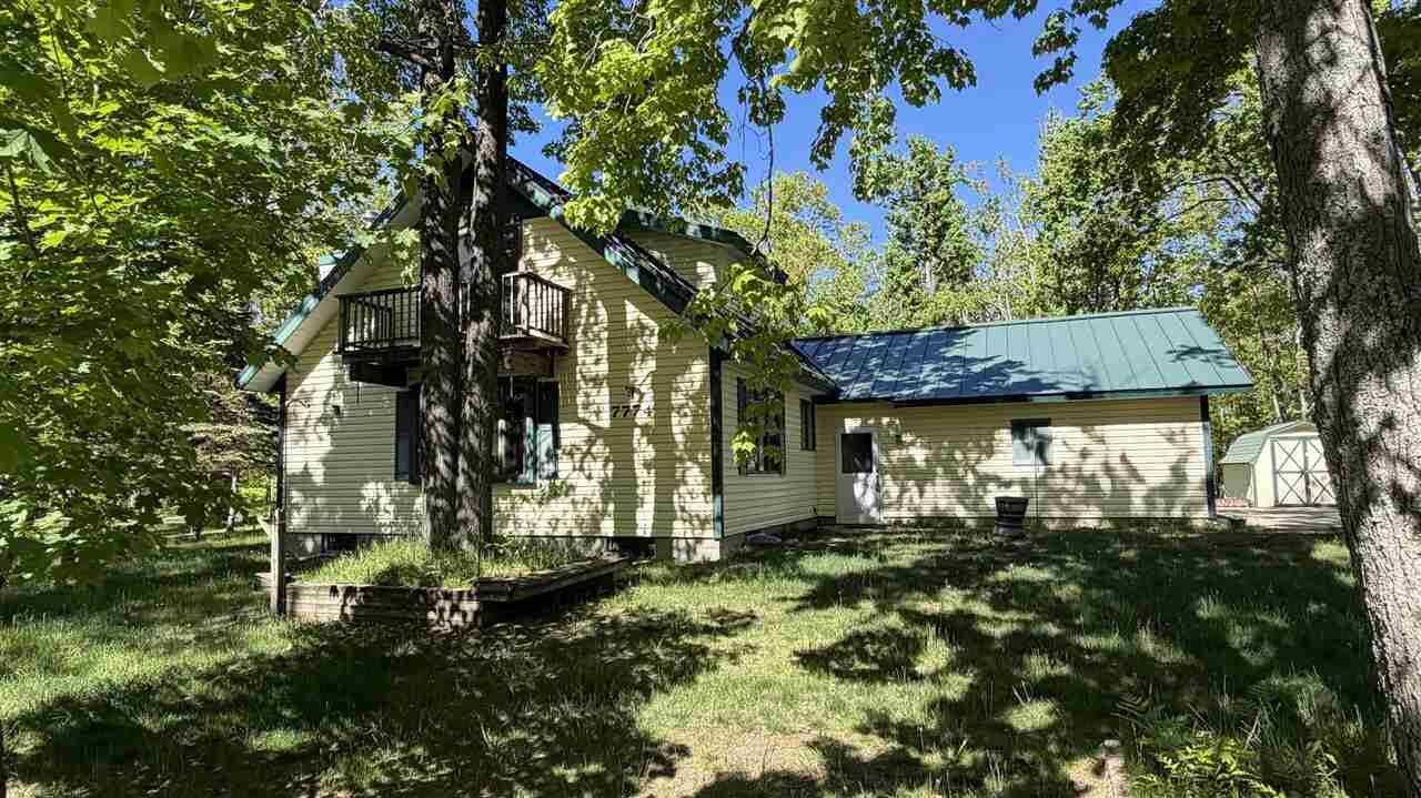 Property Photo:  7774 Sandpiper  MI 49735 