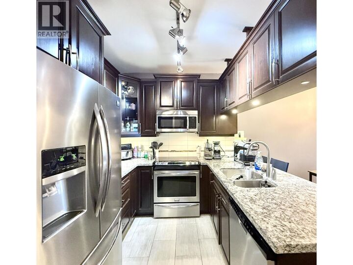 Property Photo:  12655 190A Street 209  BC V3Y 0E9 