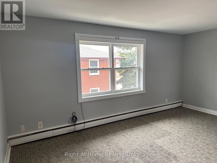 Property Photo:  119 Rossland Road East Apt. 4  ON L1G 2W5 