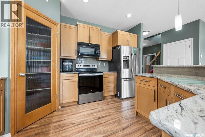 Property Photo:  1640 Maple Rose Crescent N  SK S4X 0J6 