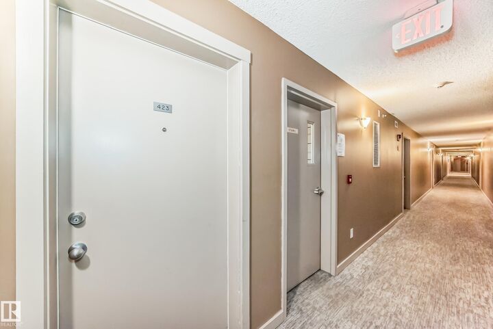 Property Photo:  18126 77 Street NW 423  AB T5Z 0N7 