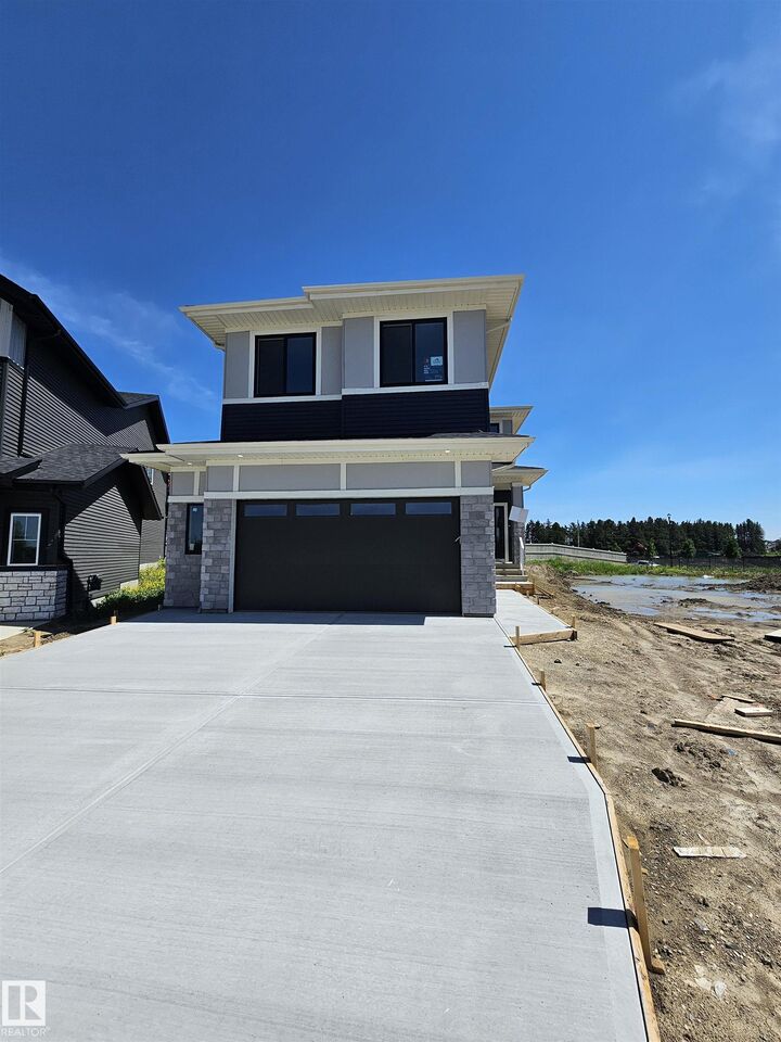 Property Photo: 3311 Chernowski Way SW AB T6W 5H2