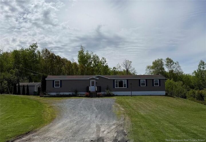 Property Photo:  678 Toussaint Road  NB E7B 2T8 