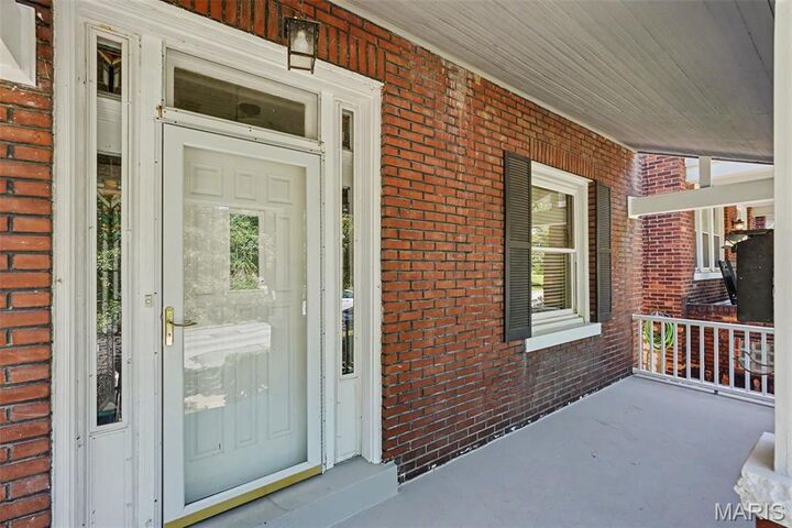 Property Photo:  5008 Sutherland Avenue  MO 63109 