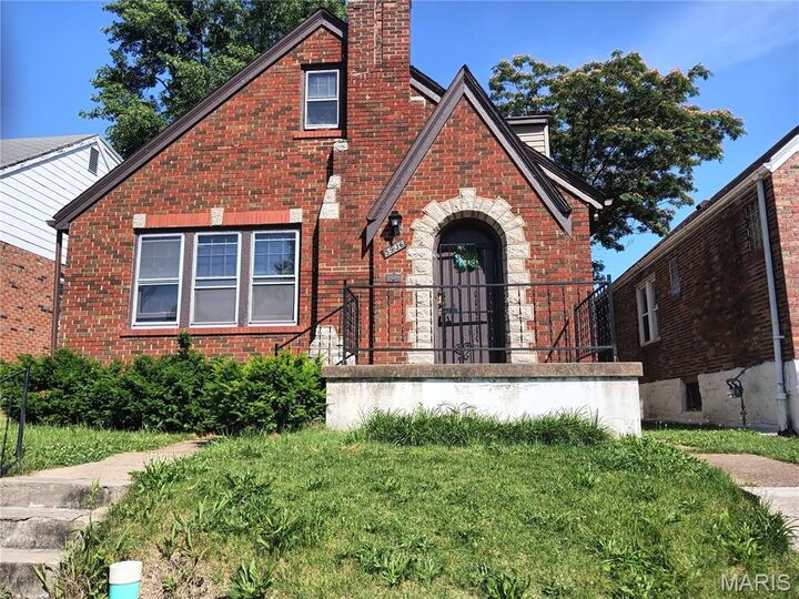 Property Photo:  5936 Pamplin Avenue  MO 63147 