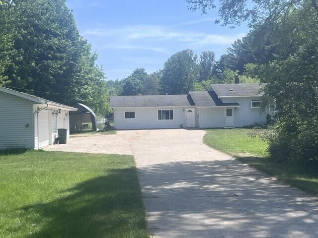 Property Photo:  8671 13 Mile Road  MI 49614 