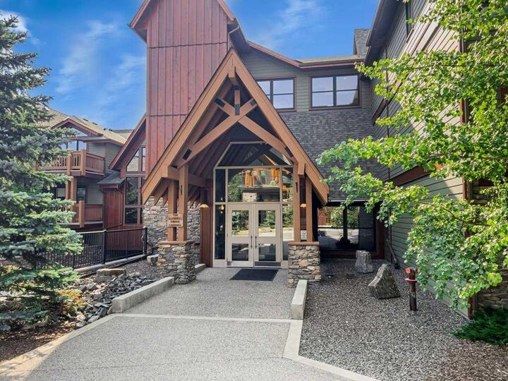 Property Photo: 106 Stewart Creek Landing 105 AB T1W 0G6