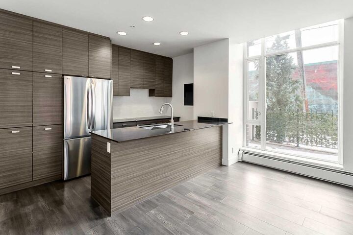 Property Photo:  1500 7 Street SW 103  AB T2R 1A7 
